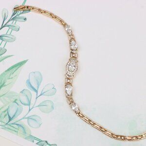"Elegant Oval-Cut Crystal Rose Gold Bracelet with Bow Accents, XPBL0800